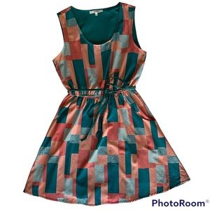 Sleeveless dress by Koton with elastic waist and tie belt. Size 38 EU, 10 UK